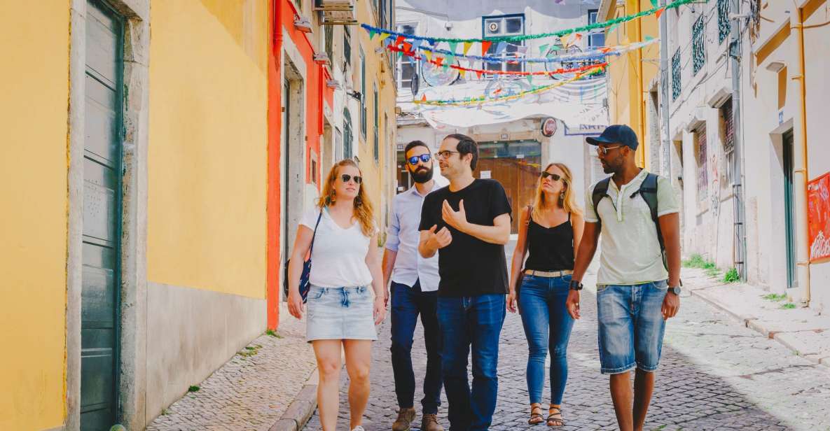 Best of Lisbon Walking Tour: Rossio, Chiado & Alfama - Rossio Square, St. Dominic’s Square, and the Neo-Manueline Details at Rossio Station