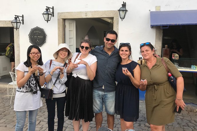 Fatima, Nazare, Obidos 8-People Small Group, Day-Tour from Lisbon - Óbidos Village: Walled Streets, Flowers, and the Ginjinha Ritual