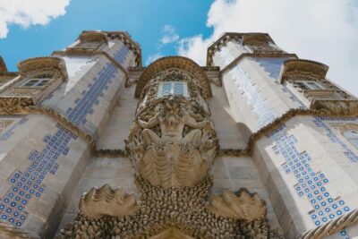 From Lisbon: Sintra, Regaleira and Pena Palace Guided Tour - Quinta da Regaleira: gardens, puzzles, and the Initiation Well