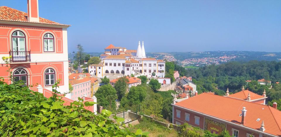 From Lisbon: Sintra, Regaleira and Pena Palace Guided Tour - Pena Palace: Romanticism, sea views, and inside-the-story wandering