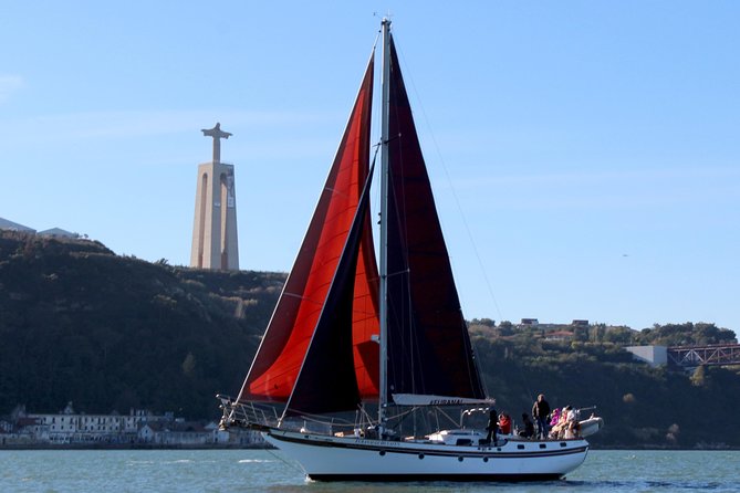 Lisbon: Daylight or Sunset on a Vintage Sailboat - Timing and weather: staying warm without ruining the evening