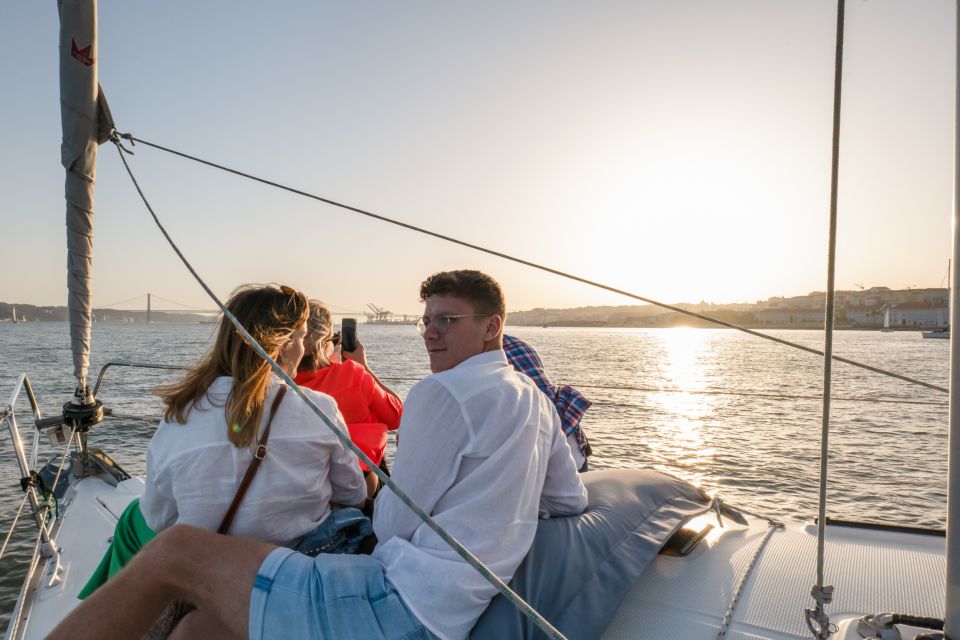 Lisbon: Daytime/Sunset/Night City Sailboat Tour with Drink - Passing Under the 25 de Abril Bridge: Lisbon’s Engineering Moment