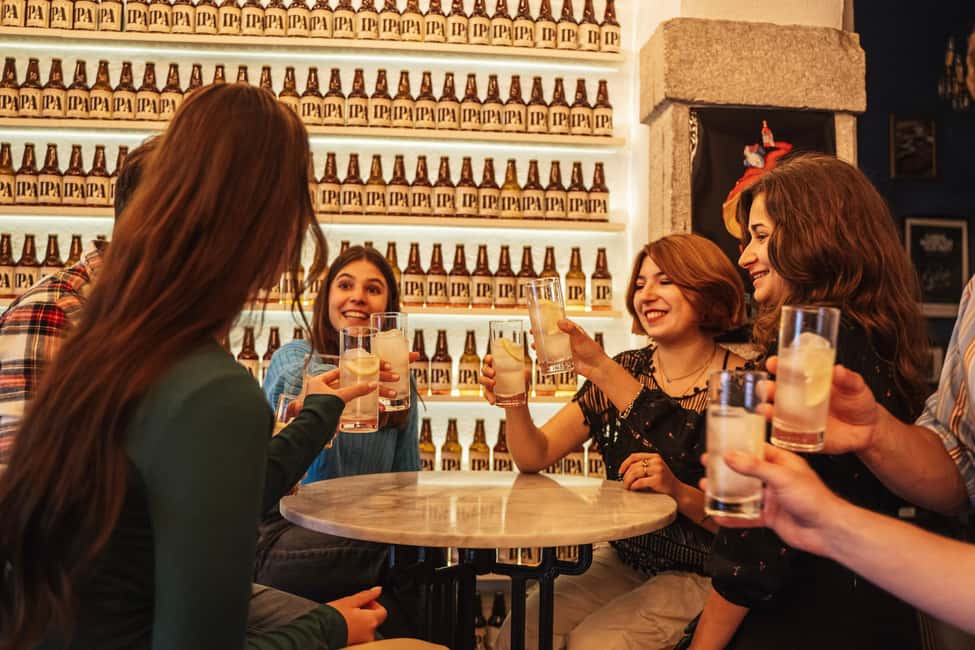 Lisbon: Drunken History Walking Tour with Included Drinks - The guides: storytelling style ranges, and that’s part of the fun