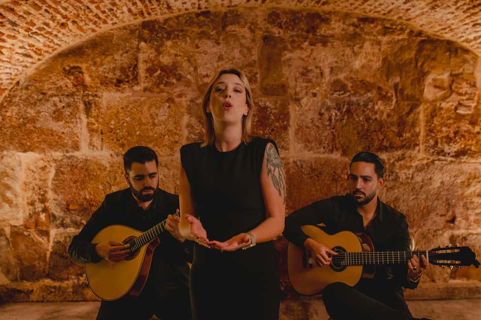 Lisbon: Fado Show with Wine in a Historic Venue - Key highlights you’ll feel right away