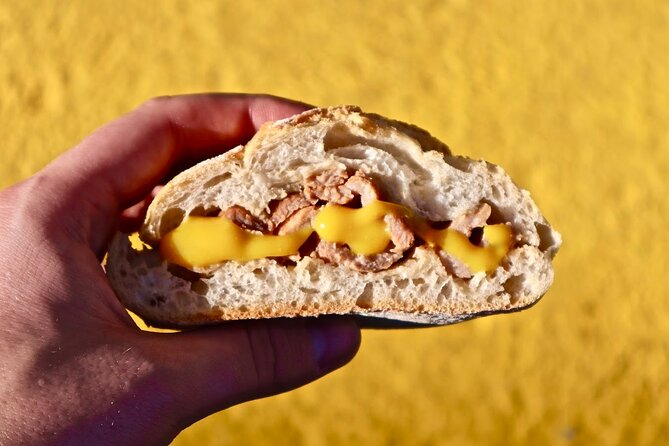 Lisbon Food Tour with 10+ Tastings of Local Delicacies & Wines - Wine and liqueur stops: Porto wine, ginjinha, and vinho verde