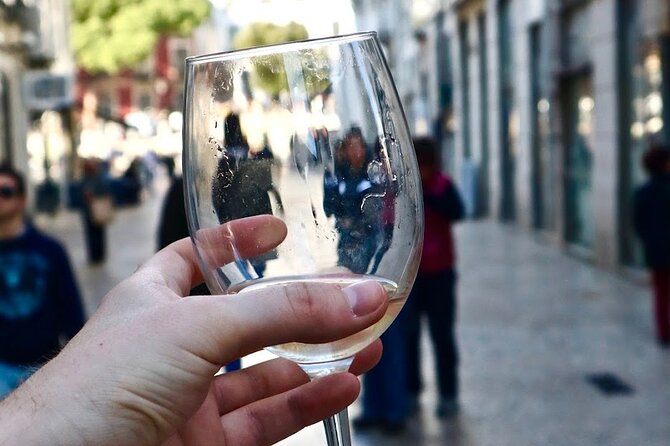 Lisbon Food Tour with 10+ Tastings of Local Delicacies & Wines - Walking route: Restauradores to Santa Justa, then into Alfama vibes