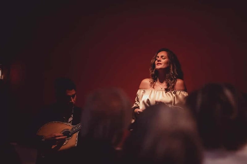 Lisbon: Live Fado Show with Port Wine in Historic Center - Baixa Chiado check-in at Rua do Crucifixo 84