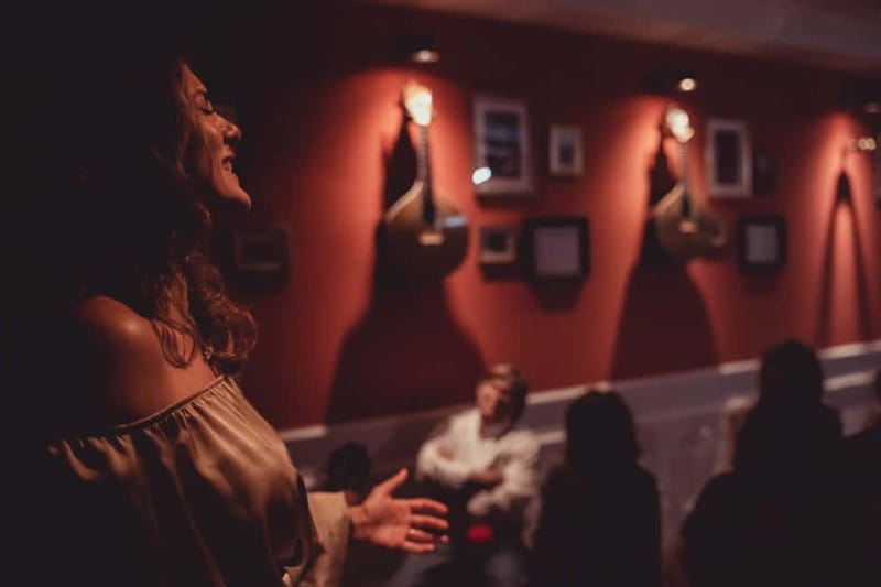 Lisbon: Live Fado Show with Port Wine in Historic Center - What the multimedia inserts teach you between songs