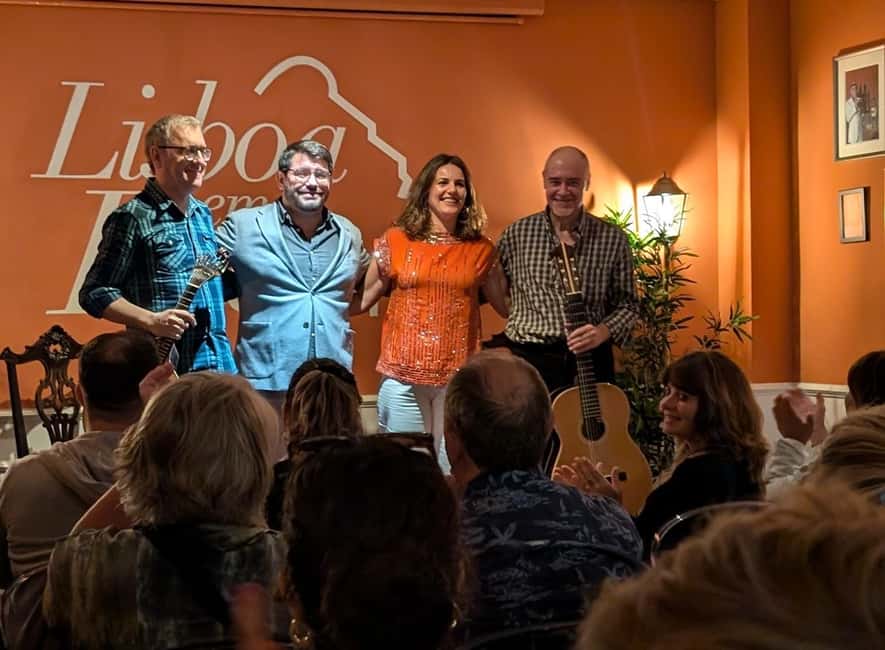 Lisbon: Live Fado Show with Port Wine in Historic Center - Audience participation in a small room