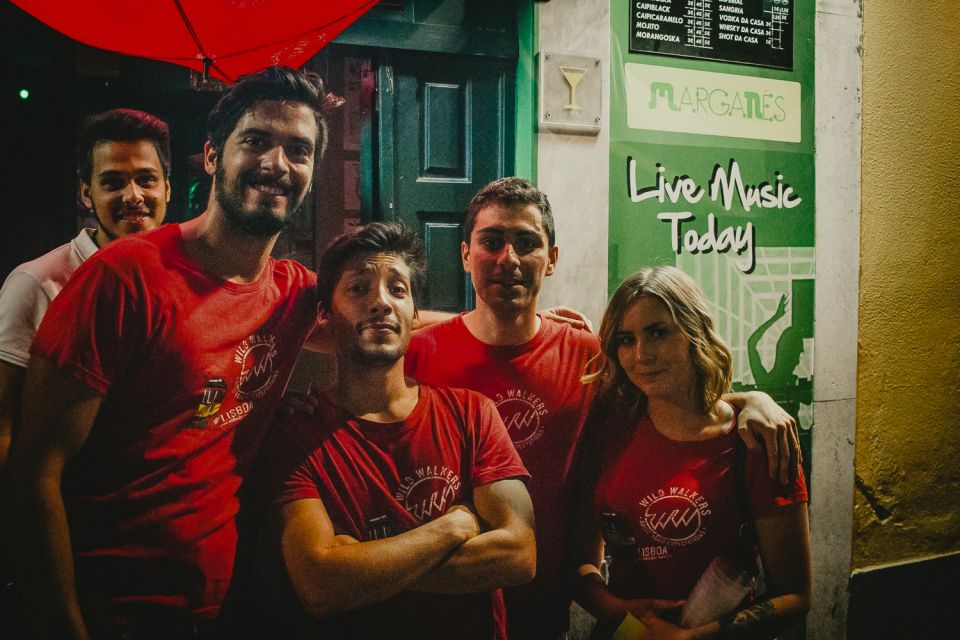 Lisbon: Pub Crawl with Open Bar and VIP Club Entry - Bairro Alto at night: why this crawl fits Lisbon