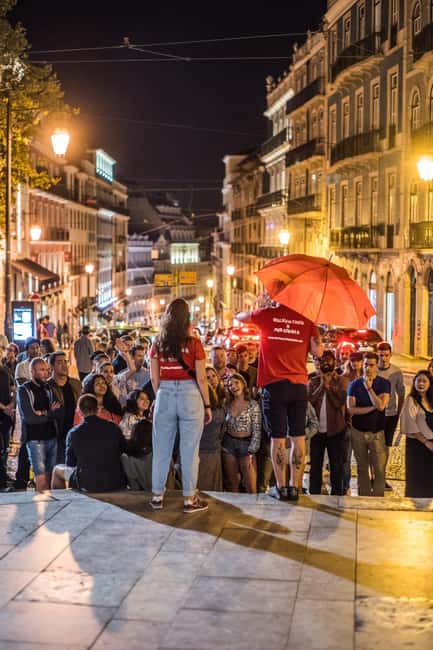 Lisbon: Pub Crawl with Open Bar and VIP Club Entry - Stop 1 at the start: open bar beer or sangria plus shots