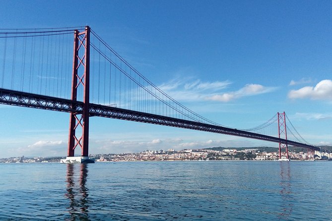 Lisbon Sailing Tour on a Luxury Sailing Yacht with 2 Drinks - What Happens Mid-Cruise: Drinks and Portuguese Appetizers