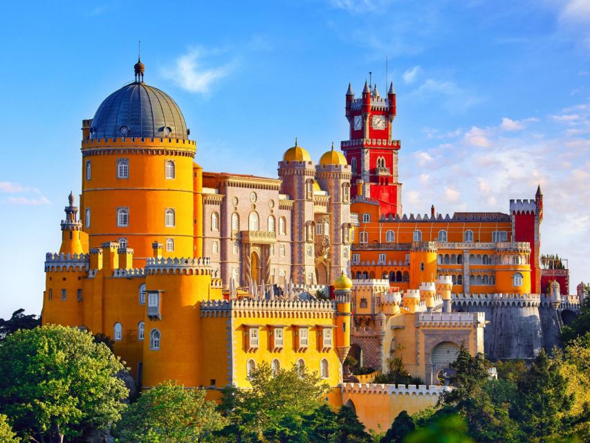 Lisbon: Sintra, Pena, Cabo da Roca Coast & Cascais Day Tour - Cabo da Roca cliffs and Guincho Beach: fast stops for big ocean energy