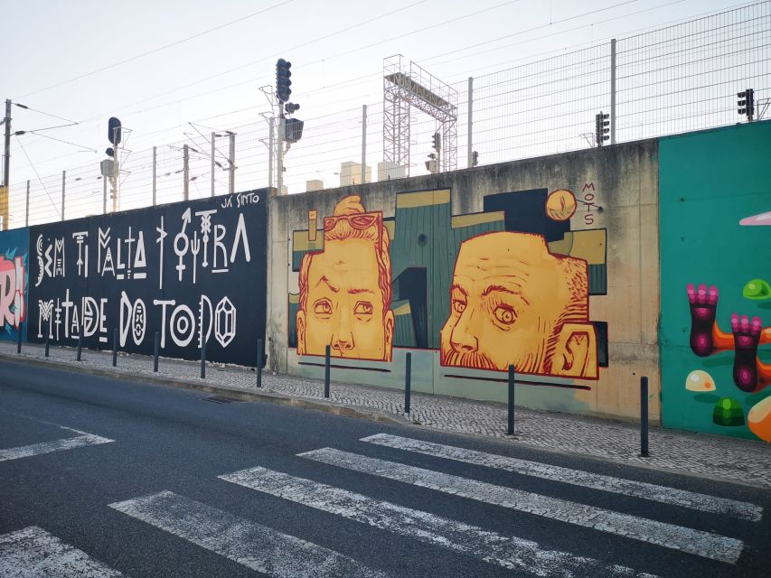 Lisbon: Street Art Tuk Tuk Tour - Hilltop murals and the Tejo view in the distance