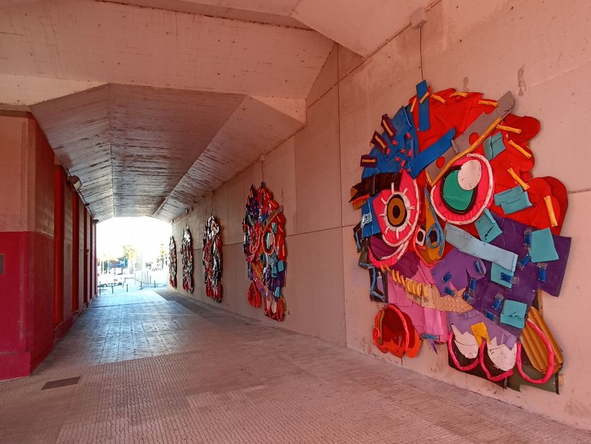 Lisbon: Street Art Tuk Tuk Tour - Art deco industrial warehouses and the city’s worker-era backbone