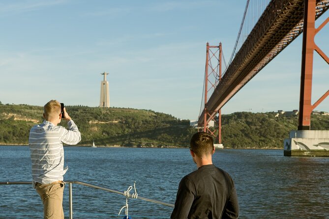 Lisbon: Sunset Catamaran Boat Tour with Music and Drinks - Nets vs covered deck: where you’ll get the best comfort (and photos)