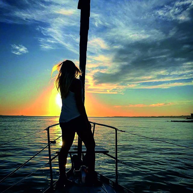 Lisbon: Sunset Sailing Cruise with Wine - The wine and snack vibe: green wine, chips, and warm pastel de nata
