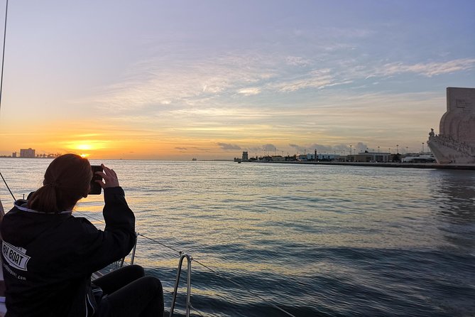 Lisbon Sunset Sailing Tour on Luxury Sailing Yacht with 2 Drinks - Choosing Your Seat: Front Views, Covered Comfort, and Where to Find Warmth