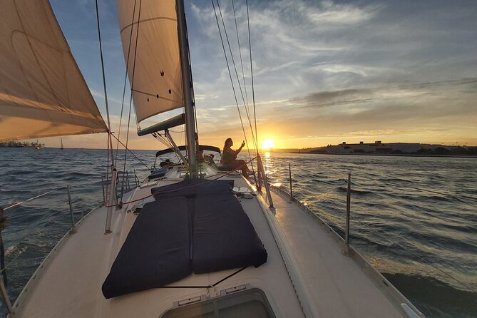 Lisbon Sunset Sailing with Portuguese Wine and History - From 25th April Bridge to Cristo Rei: Lisbon from both sides of the Tagus