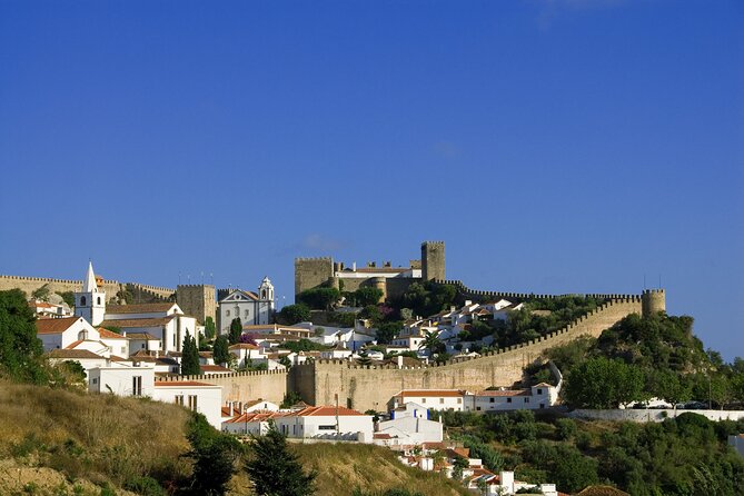 Lisbon Super Saver: 2-Day Sintra, Cascais, Fatima, Nazare and Obidos Small-Group Day Trips - Óbidos Walls, Flowerpots, and Ginja Liqueur: The Day 2 Finale