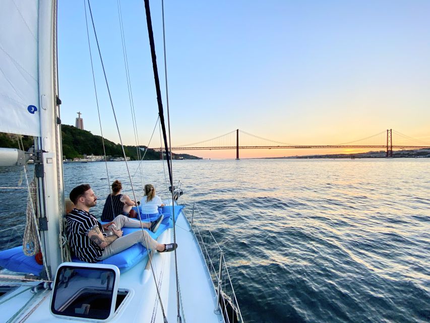 Lisbon: Tagus River Sunset Cruise with Drinks - What it feels like on board: hosts, comfort, and real sailing vibes