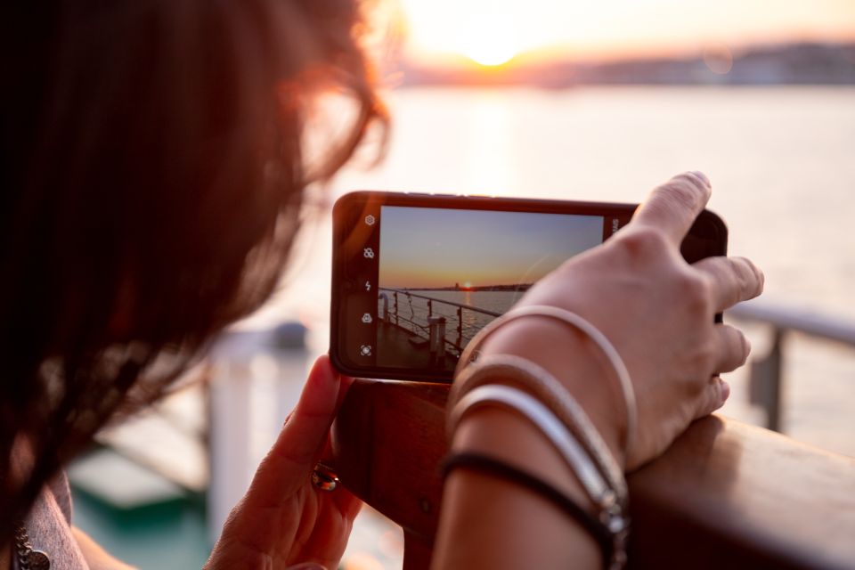 Lisbon: Tagus River Sunset Tour with Snacks and Drink - Belém Tower at golden hour: waterline photos that feel cinematic