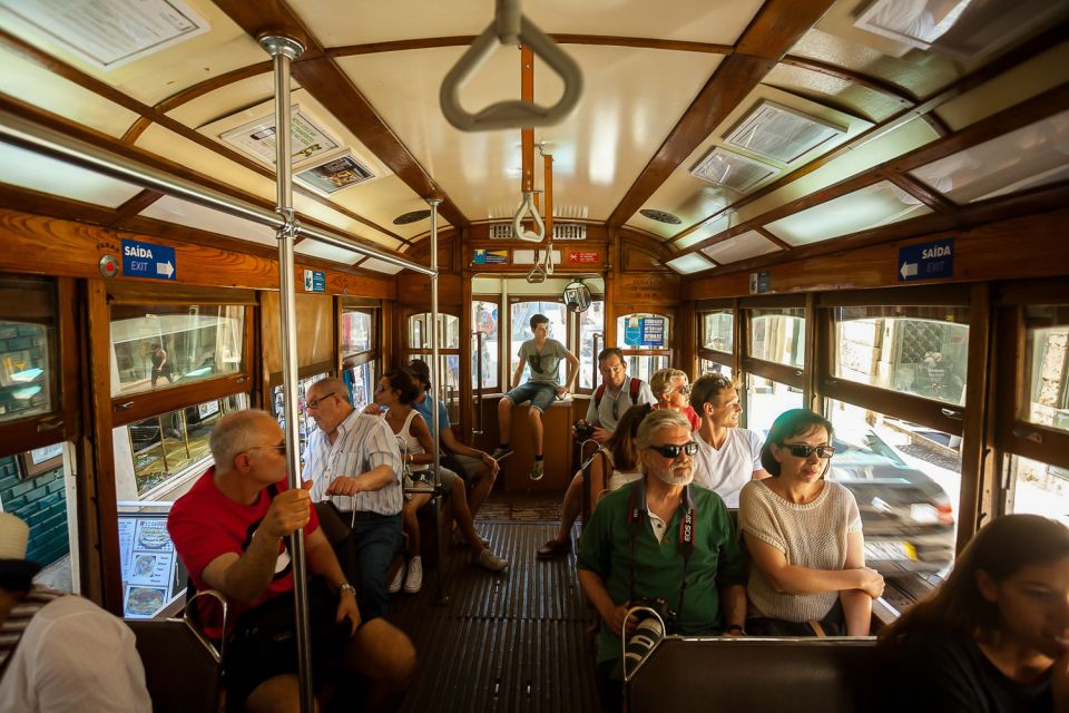 Lisbon Tram No. 28 Ride & Walking Tour - Alfama on foot: narrow streets, tiny squares, and real pace