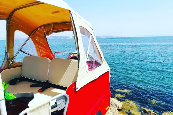 Tuk Tuk Lisbon Guided tour! 100% PRIVATE & PERSONALIZED - Alfama as your first move: ginjinha in chocolate and the old-street vibe